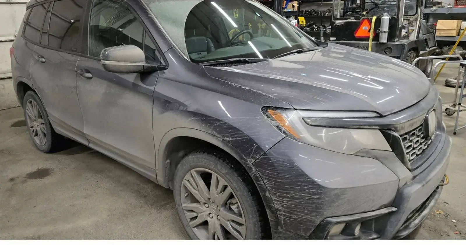 Honda Passport coated in dust and road film before exterior detailing in Anchorage, Alaska