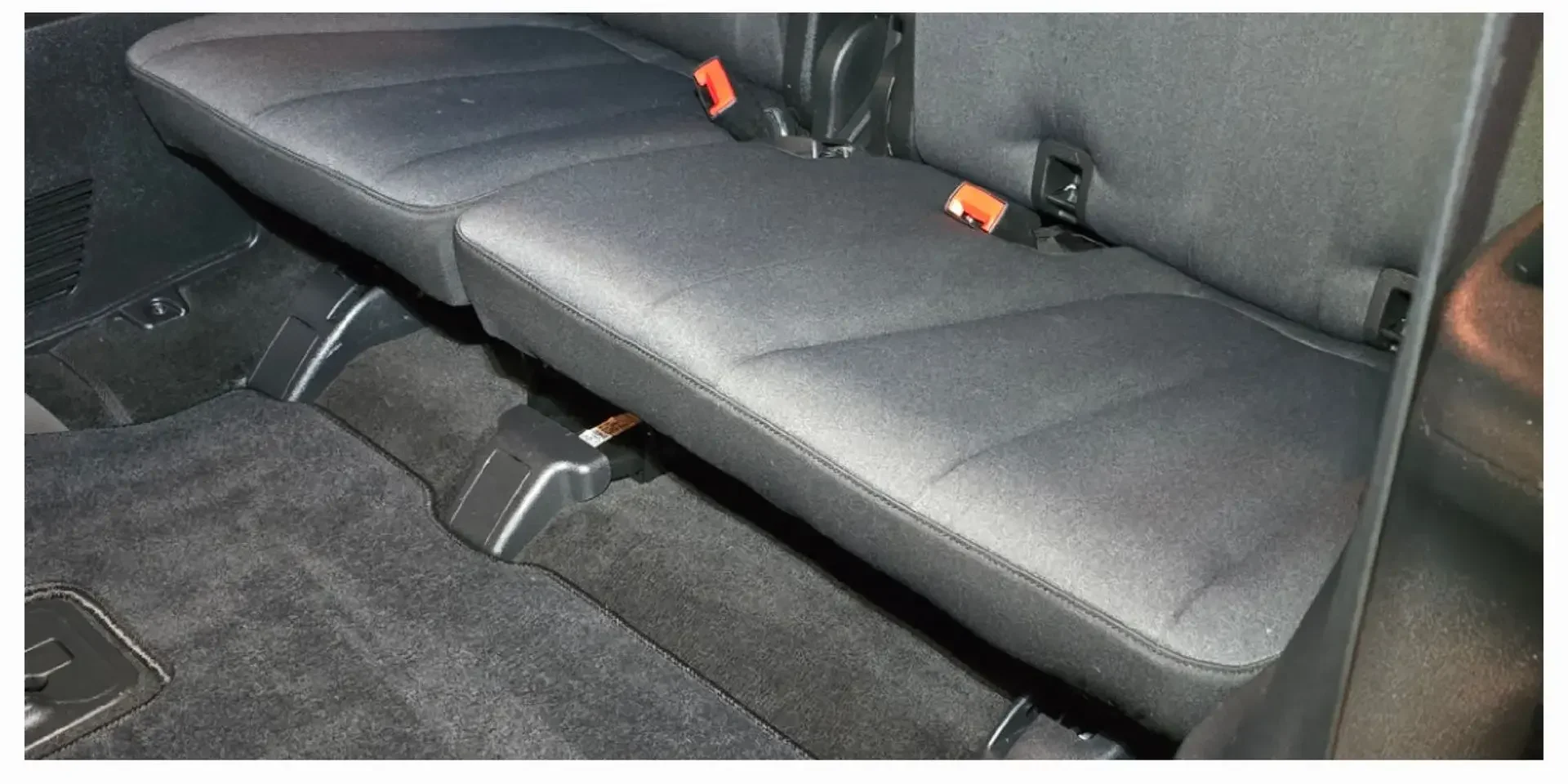 SUV rear bench seat and carpet cleaned and extracted after odor and stain removal in Anchorage, Alaska