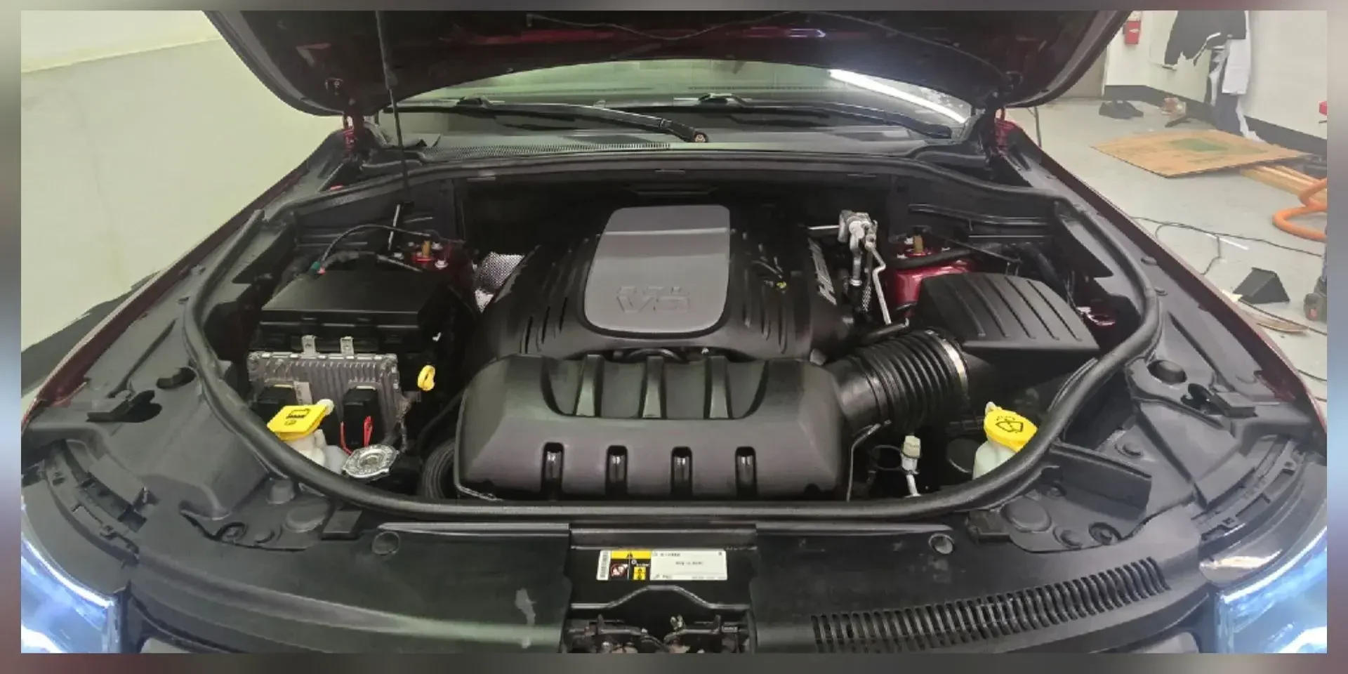 Jeep Grand Cherokee engine bay cleaned and detailed by Twisted Auto Detail in Anchorage, Alaska