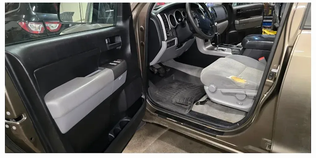 Toyota Tundra cabin, carpet and door panel cleaned and dressed after interior detailing